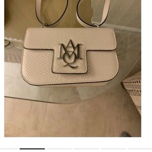 Alexander McQueen leather bag.